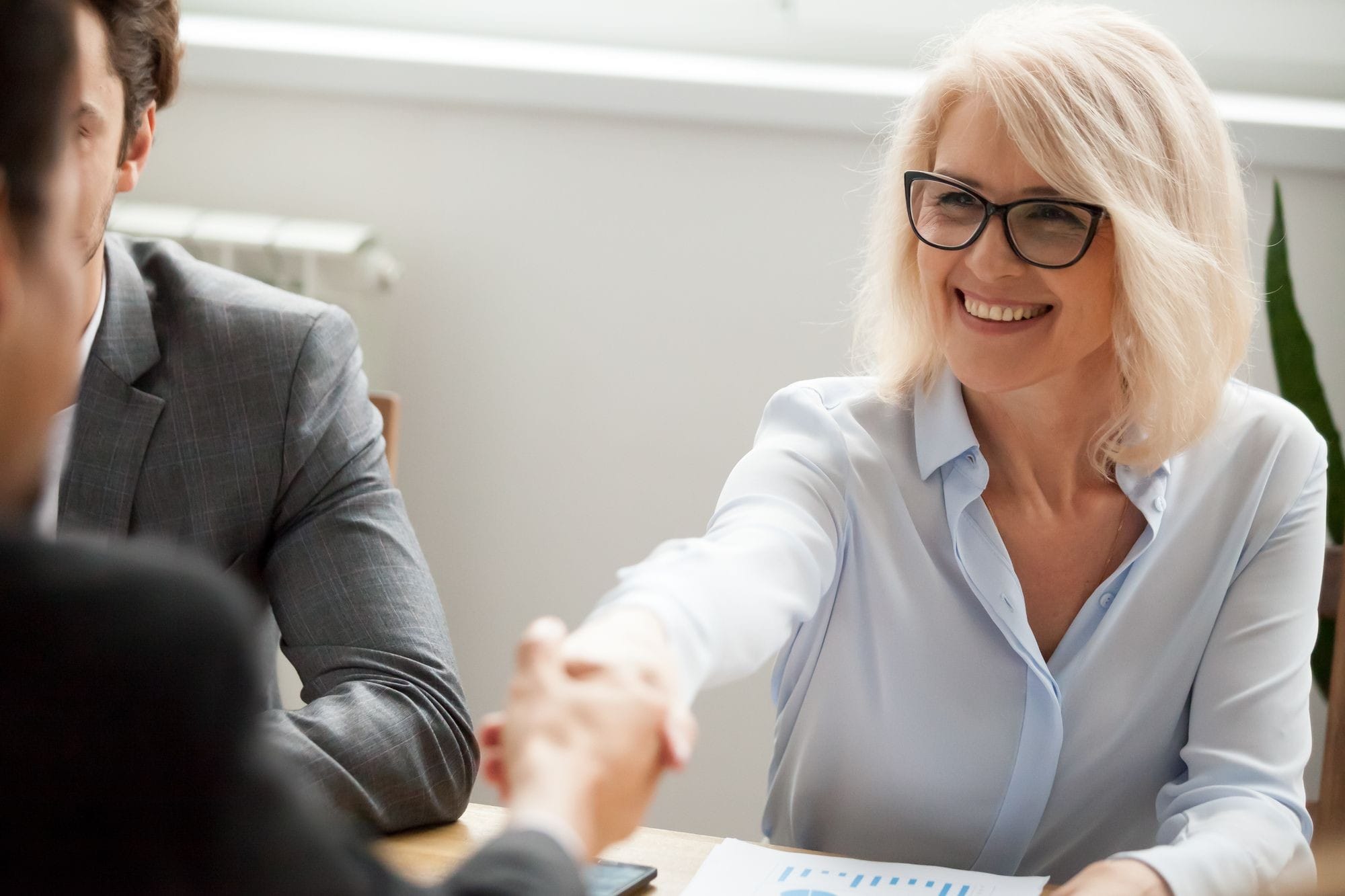 Old Woman Meeting with other Professionals